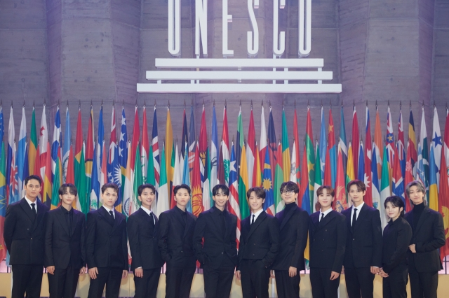 K-pop group Seventeen poses for picture at UNESCO headquarters in Paris, France, on Tuesday. (Pledis Entertainment)