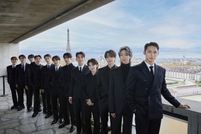 K-pop group Seventeen poses for picture at UNESCO headquarters in Paris, France, on Tuesday. (Pledis Entertainment)