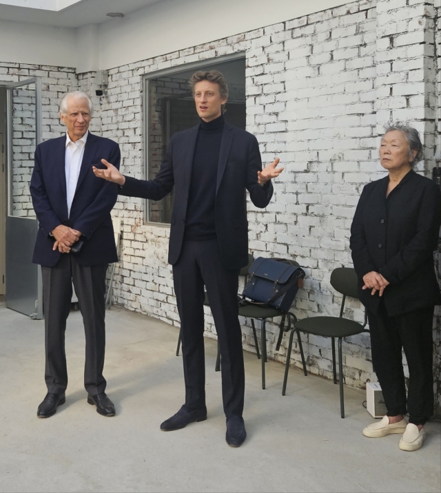 From left: Dominique de Villepin, Arthur de Villepin and artist Kang Myong-hi attend the press opening of the exhibition 