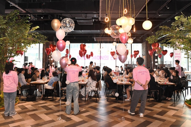 Participants attend a mass blind date event called 