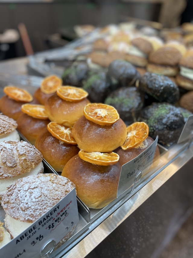 Wimi Hallabong cream donuts are on display at Abebe Bakery at Gwangjang Market (Kim Da-sol/The Korea Herald)