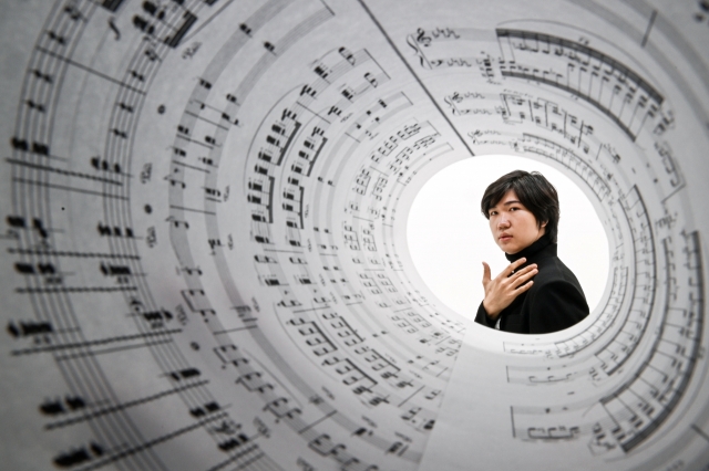 Pianist Kim Song-hyeon, the second place winner of the 2023 Isangyun Competition, poses for photos during an interview with The Korea Herald on Nov. 6 at Herald Square in Seoul. (Park Hae-mook/The Korea Herald)