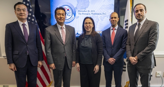 South Korean and US officials pose for a photo as they attend the second session of the Nuclear Consultative Group at the Pentagon near Washington on Dec. 15, 2023, in this photo released by South Korea’s government delegation. From left to right: Deputy Minister for National Defense Policy Heo Tae-keun, Principal Deputy National Security Adviser Kim Tae-hyo, US Acting Under Secretary of Defense for Policy Sasha Baker, Vipin Narang, US principal deputy assistant secretary of defense for space policy, and Maher Bitar, US National Security Council coordinator for intelligence and defense policy. (Yonhap)