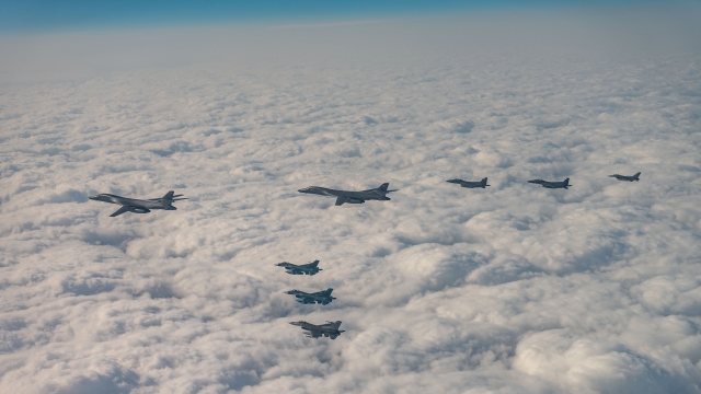 US B-1B strategic bombers are seen being escorted by South Korean F-15K, US F-16 and Japanese F-2 fighter jets in a combined air exercise over waters east of the southern resort island of Jeju on Wednesday. (Joint Chiefs of Staff)