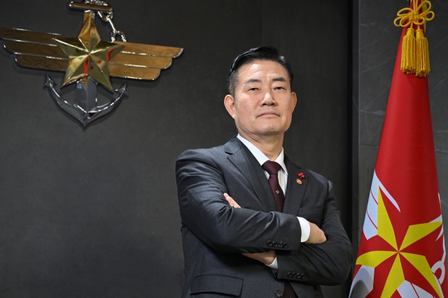 Shin poses for photograph during an interview with The Korea Herald at the ministry office in Yongsan, central Seoul, on Monday. (Im Se-jun/The Korea Herald)