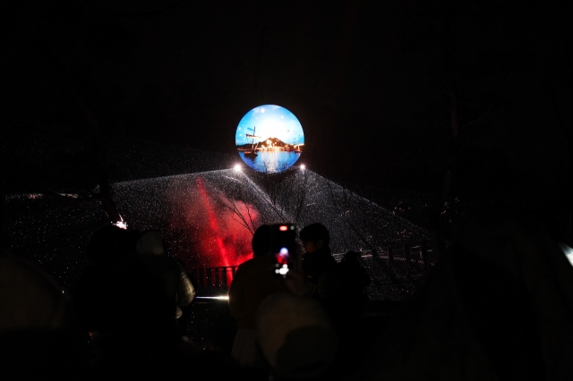 Aegibong Moonlight Light Show's laser performance at Aegibong Peace Ecopark in Gimpo, Gyeonggi Province, Saturday. (Lee Si-jin/The Korea Herald)