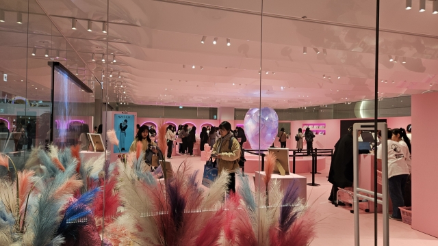 Young fans go through a pop-up store installed to promote virtual idol group PLAVE on the fifth floor of The Hyundai Seoul. (The Korea Herald/Shim Woo-hyun)