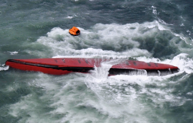 This photo shows a South Korean chemical tanker that overturned in waters off Japan's western city of Shimonoseki in Yamaguchi Prefecture on Wednesday. (The Associated Press)