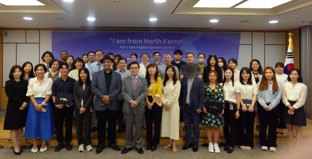 Participants pose for photos at the 18th Freedom Speakers International English speech contest held August 26, 2023. (FSI)