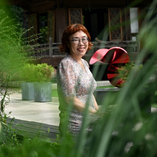 Lee Geum-yi poses for a photo in an interview with The Korea Herald in 2023. (Park Hae-mook/The Korea Herald)