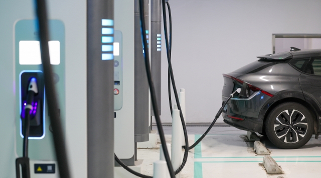 This photo taken on March 14 shows an EV at a charging station in Seoul. (Yonhap)