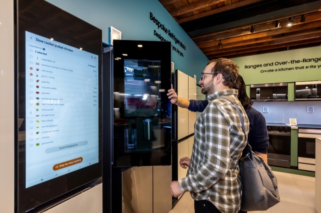 Visitors explore the newest Bespoke AI home appliance lineup at Samsung Electronics' Bespoke AI media day in New York on April 3. (Samsung Electronics)