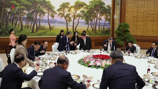 This photo, carried by North Korea's official Korean Central News Agency on Saturday, shows China's top legislator, Zhao Leji, meeting with North Korean Leader Kim Jong-un in Pyongyang, Saturday. (Yonhap)