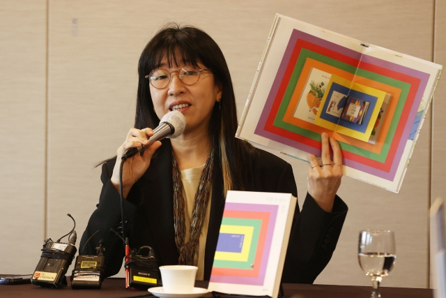 Lee Suzy speaks during a press conference in Seoul in March. (Yonhap)