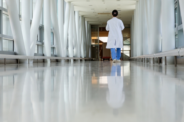 Medical personnel walks down the corridor at a university hospital in Seoul on Wednesday. (Yonhap