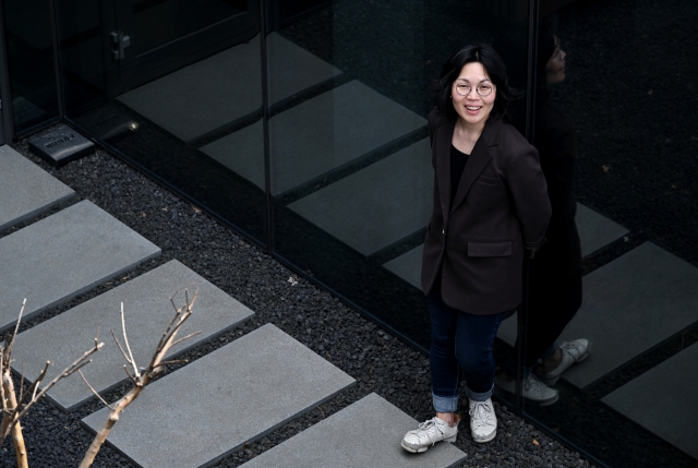 Jung Ju-yeon, founder and executive director of Wear Again Lab, poses for a photo on a roof terrace at her office's building in Seongsu-dong, Seoul, April 5. (Im Se-jun/The Korea Herald).