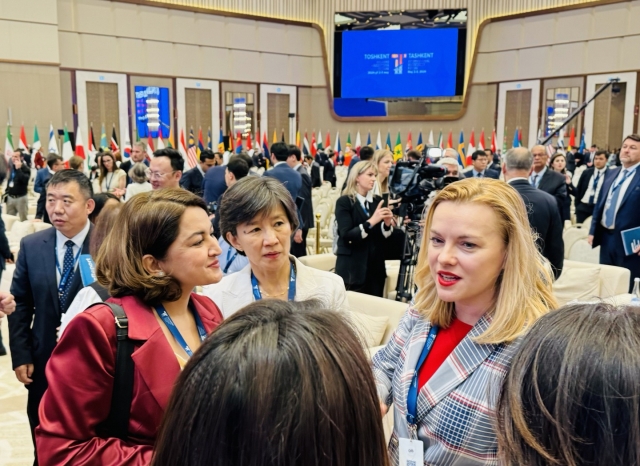 Deputy Secretary-General of the UN and Executive Secretary of the European Economic Commission, Tatiana Molcean, interacts with reporters at the Tashkent Investment Forum held at Tashkent City Congress Hall in Tashkent on Thursday. (Sanjay Kumar/The Korea Herald)