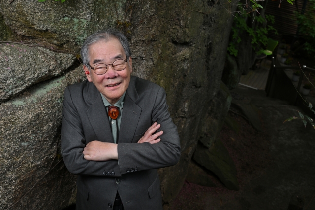 Rhee Kun-hoo poses for photos during an interview with The Korea Herald, in Seoul, in April. (Im Se-jun/The Korea Herald)