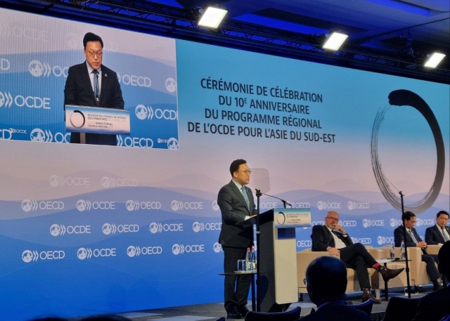 First Vice Finance Minister Kim Byoung-hwan speaks at a ministerial meeting of the Organization for Economic Cooperation and Development in Paris in May 2024, in this photo provided by Seoul's finance ministry. (Yonhap)