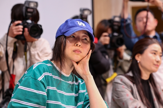 Ador CEO Min Hee-jin at a press conference held in Seoul on April 25. (Yonhap)