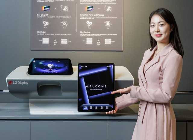 A model presents LG Display's Advanced Thin OLED for vehicles. (LG Display)