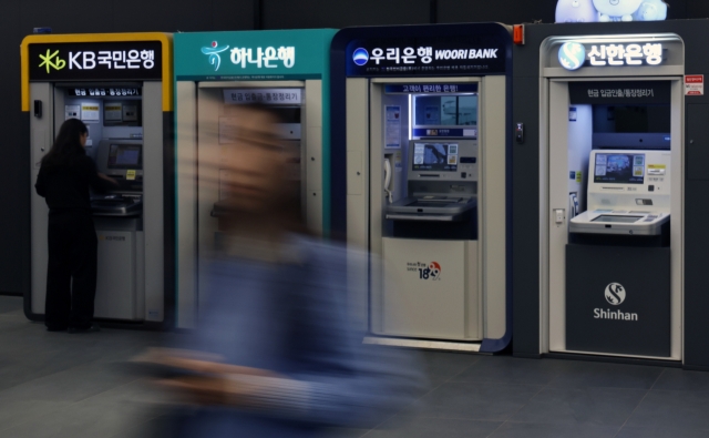 Automated teller machines are installed at a building in Seoul on April 9. (Newsis)