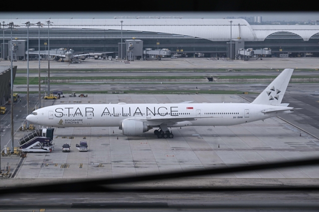 The Singapore Airlines Boeing 777-300ER airplane seen on the tarmac at Suvarnabhumi International Airport in Bangkok on Wednesday. (AFP)