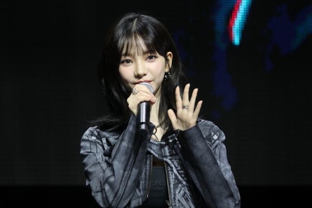 One of the aespa members Karina speaks during a press conference held in Seoul, Monday. (Yonhap)