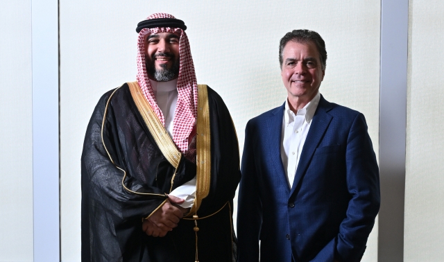 Prince Faisal bin Bandar bin Sultan Al Saud (left), chairman of the Saudi Esports Federation, and Brian Ward, CEO of Savvy Games Group, pose for a photo before an interview with The Korea Herald in Seoul on Wednesday. (Im Se-jun/The Korea Herald)