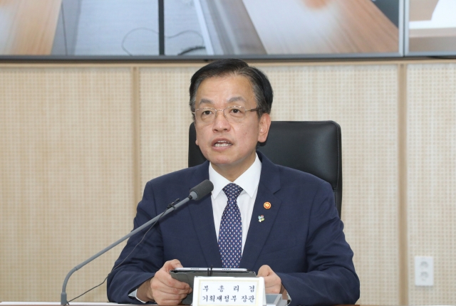 Finance Minister Choi Sang-mok speaks during an economic ministers' meeting in the central administrative city of Sejong, 113 kilometers south of Seoul, on Monday. (Yonhap)