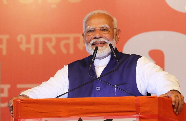 Indian Prime Minister Narendra Modi speaks at the party headquarters in New Delhi, India on Tuesday.