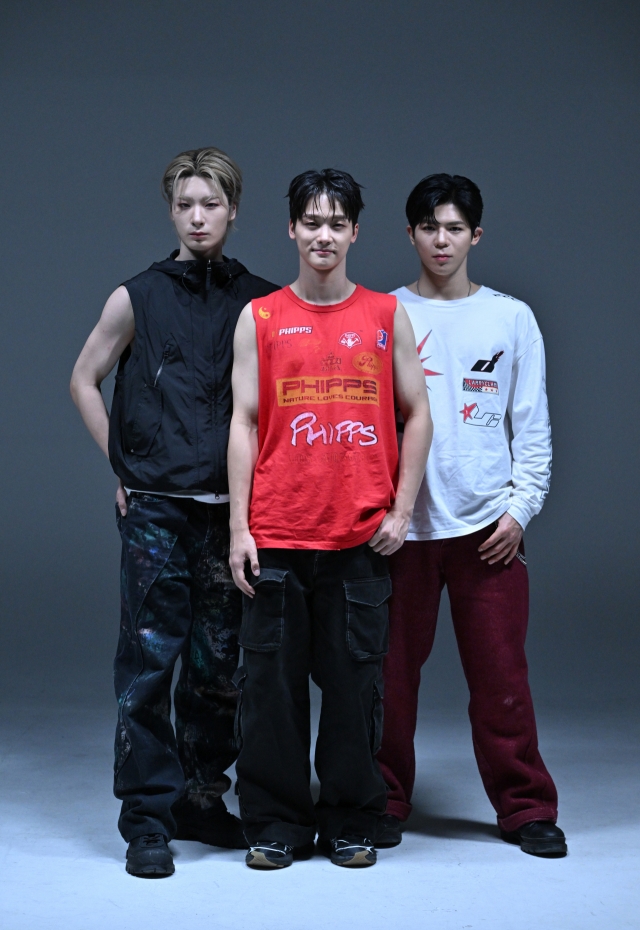 From left: Big Ocean members Jiseok, Hyunjin and Chanyeon pose for photos during an interview with The Korea Herald, Monday. (Im Se-jun/The Korea Herald)