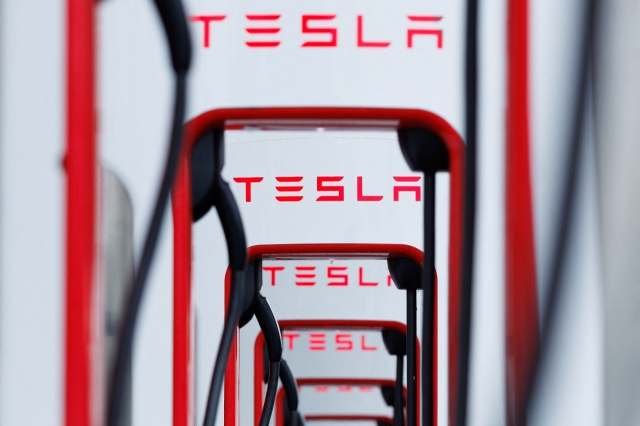 A row of Tesla superchargers is shown at a supercharging location in Los Angeles, California on June 5. (Reuters)