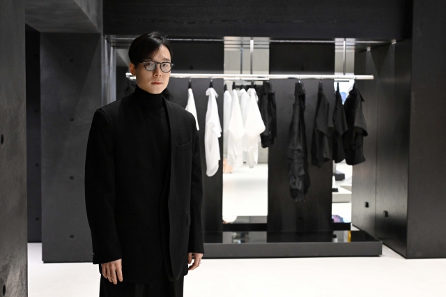 Jay Song, CEO and creative director of Songzio, poses for a photo ahead of a recent interview with The Korea Herald at Galerie Noir in Seoul. (Lee Sang-sub/The Korea Herald)