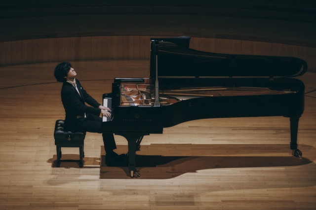 Pianist Lim Yunchan performs during his recital at Lotte Concert Hall in Jamsil, Seoul, Friday. (MOC Production)