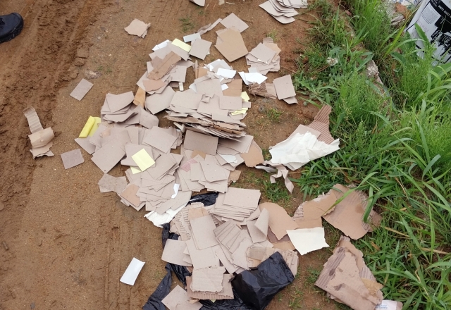 Wastepaper from North Korea’s trash-filled balloon is found scattered on the ground in Incheon, Sunday. (Incheon Fire Department via Yonhap)