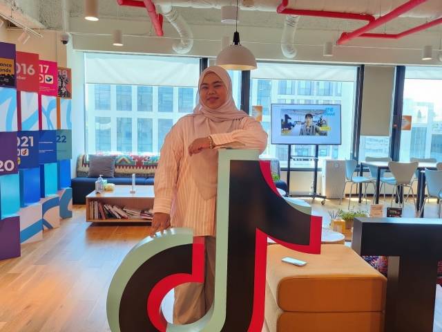 Nura Ezzatie, a TikTok content creator from Malaysia, poses for a photo during an interview with The Korea Herald at the TikTok office in Gangnam, southern Seoul, Tuesday. (Lee Jung-youn/The Korea Herald)