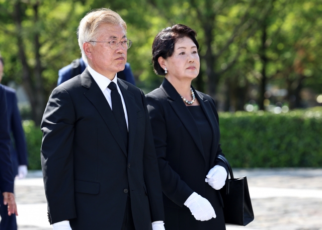 Former President Moon Jae-in and his wife Kim Jung-sook pay tribute to the late former President Roh Moo-hyun during a memorial service marking the 14th year since his death at Bongha Village in the southeastern city of Gimhae on May 23, 2023. (Yonhap)