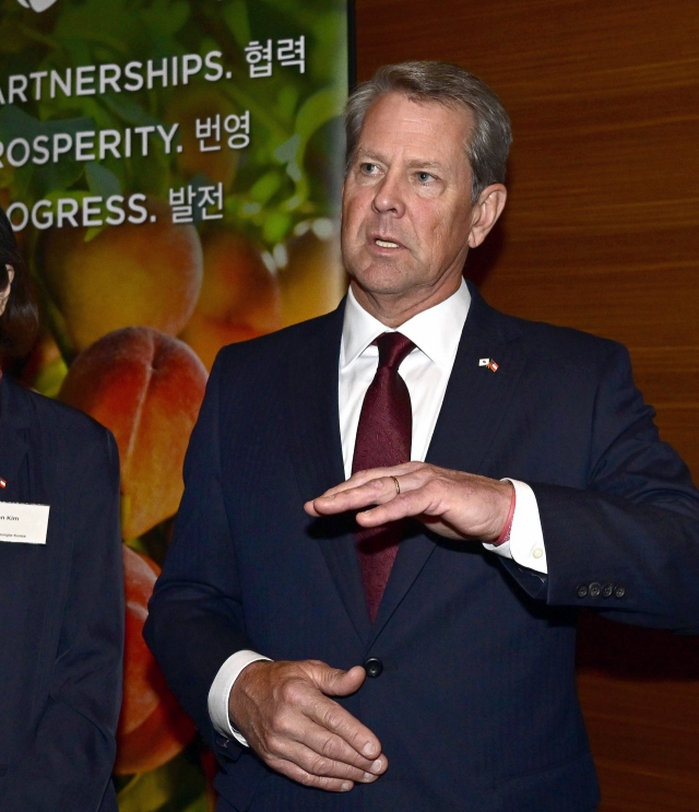 Georgia Gov. Brian Kemp speaks to reporters on the sidelines of Georgia Night in Korea, a networking event held at Conrad Seoul on Monday evening. (Hyundai Motor Group)