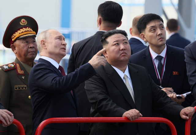 Russia's President Vladimir Putin (left) and North Korea's leader Kim Jong-un visit the Vostochny Cosmodrome in Amur region on September 13, 2023. (Pool Photo via AFP)