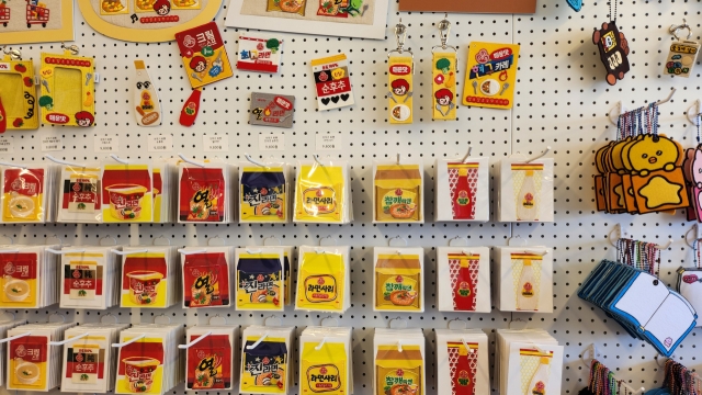 Korean food-themed patches and accessories are displayed in the prop shop Object, located in Mapo-gu, Seoul, Tuesday. (Lee Jung-youn/The Korea Herald)