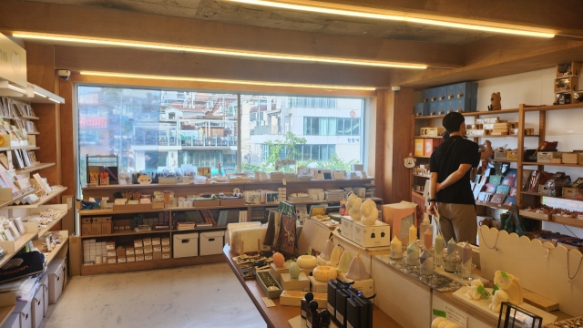 Customers look around props and products in Object, Mapo-gu, Seoul, Tuesday. (Lee Jung-youn/The Korea Herald)