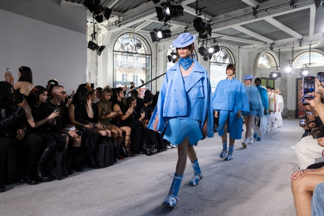 Models wear creations by Songzio as part of the Spring-Summer 2025 Paris Men’s Fashion Week on Boulevard Haussmann in Paris on Friday. (Songzio)