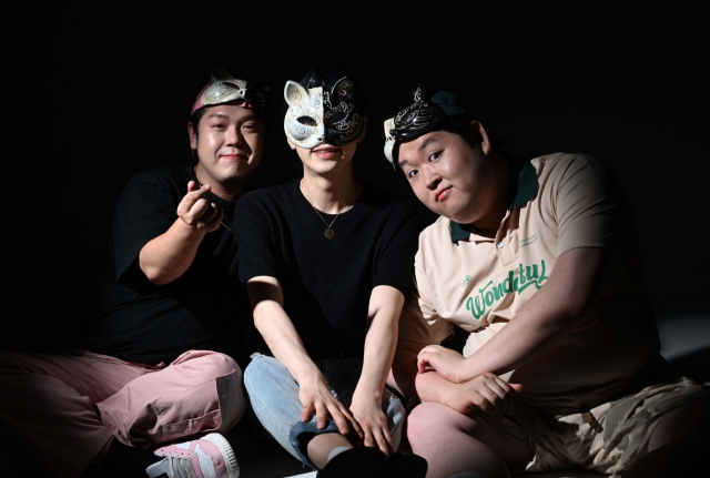 From left: Lionesses members Damjun, Kanghan, and Lee Marlang pose for a photo during the interview with The Korea Herald. (Lee Sang-sub/The Korea Herald)