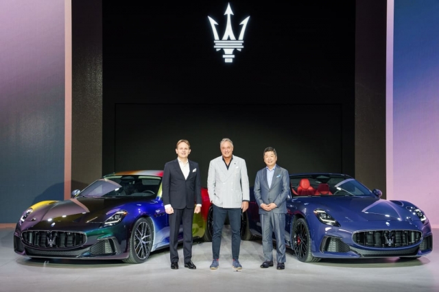 From left: Luca Delfino, chief commercial officer of Maserati, Davide Grasso, CEO of Maserati, and Takayuki Kimura, managing director of Maserati Korea and Japan, pose for a photo at the launch ceremony of Maserati Korea at Dongdaemun Design Plaza in Seoul on Wednesday. (Maserati Korea)