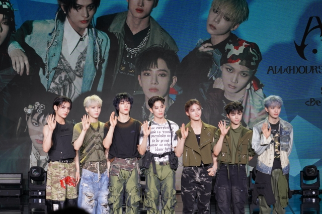 From left: All(H)ours' Masami, Minje, Xayden, Kunho, Youmin, On:n and Hyunbin pose for a photo during a press conference in Gangnam, southern Seoul, Tuesday. (Eden Entertainment)