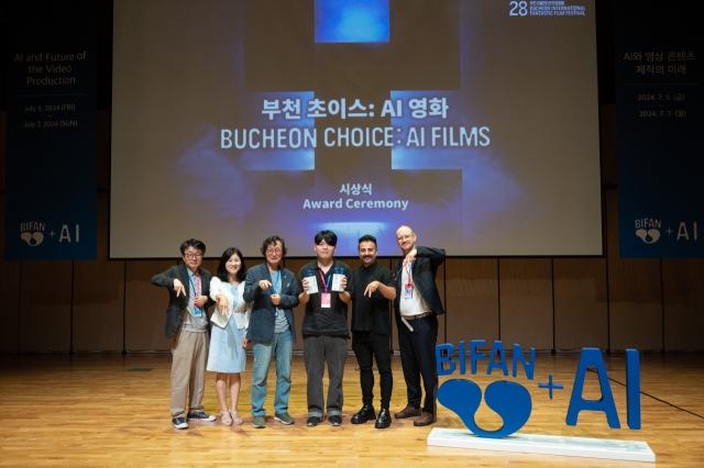 From left: The Bucheon International Fantastic Film Festival jury member Shin Chul, Finance and Culture Committee Chairperson Jang Hae-young, Organizing Committee Chair Chung Ji-young, director Bae Jun-won, jury members Ferdi Alici and Sten-Kristian Saluveer pose for a photo during an award ceremony held at Bucheon Arts Center on Sunday. (BIFAN)