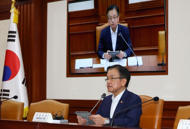 Finance Minister Choi Sang-mok (C) speaks during a meeting of economy-related ministers in Seoul on July 10, 2024. (Yonhap)