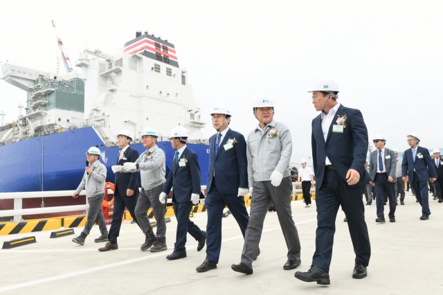 HD Hyundai Chairman Kwon Oh-gap (second from right, front) and company and city officials look around its second dolphin quay at the completion ceremony at HD Hyundai Samho yard in Yeongam, South Jeolla Province, Wednesday. (HD Hyundai)