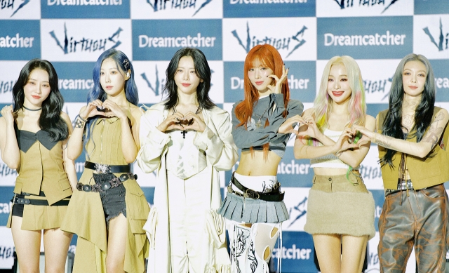 From left: Dreamcatcher members Sua, Handong, Jiu, Yoohyeon, Gahyeon and Dami pose for a photo during the press conference held in Gangnam-gu, Seoul, Wednesday. (Kwon Min-seo/The Korea Herald)